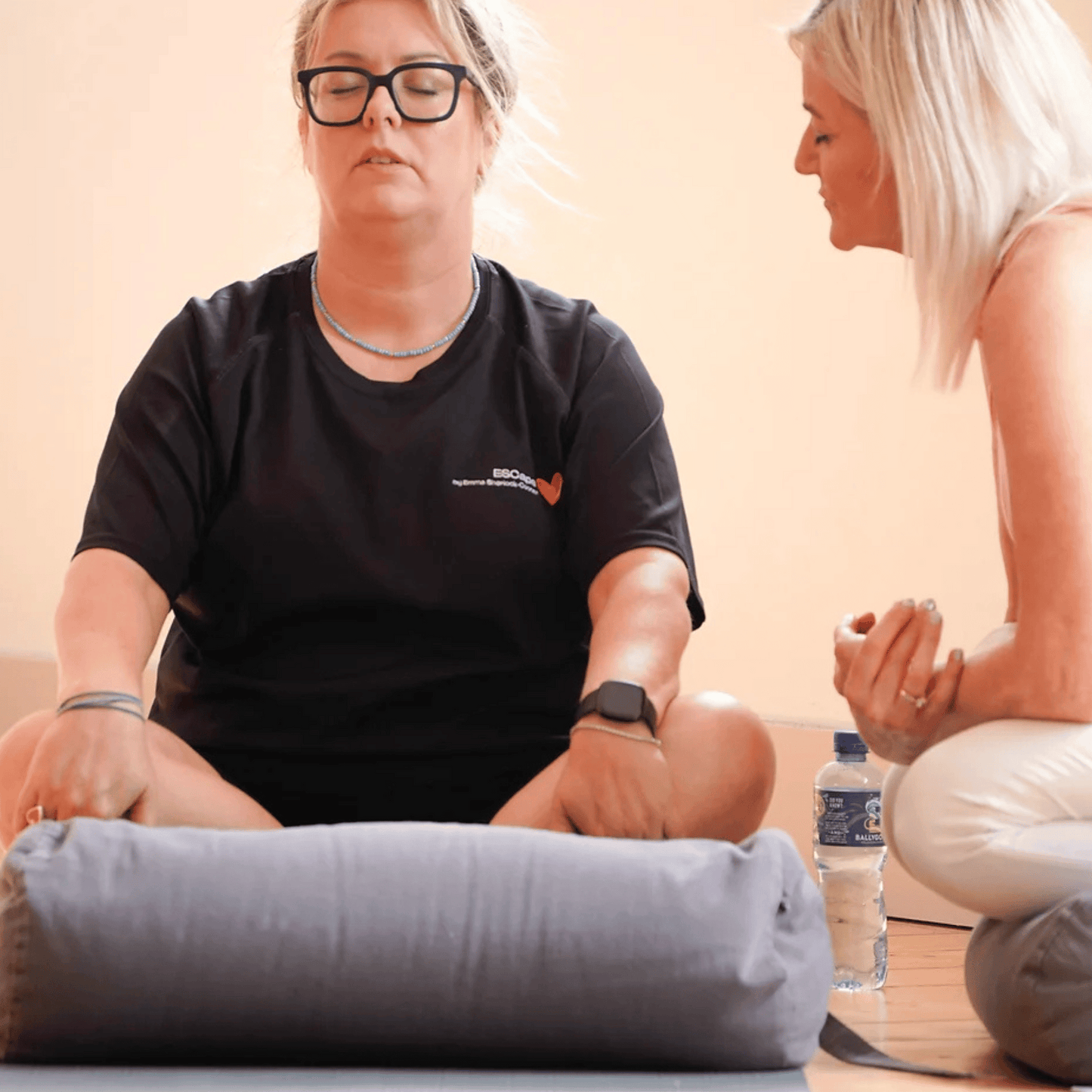 Cecelia providing personalized guidance during a 1-on-1 yoga session, focusing on flexibility, strength, and wellness at Wellness With Cecelia.